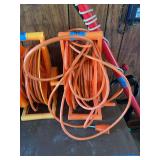 Orange Extension Cord on Plastic Reel