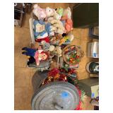 Assorted Collection of Plush Toys, Decorative Baskets, and Artificial Floral Arrangements