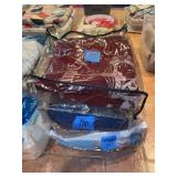 Assorted Bedding and Textiles in Storage Bags