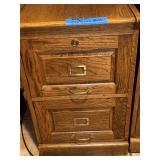 Two-Drawer Wooden Filing Cabinet with Assorted Stationery and Electronic Cables