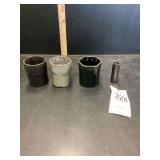 Assorted Metal Sockets and Spanner Tool