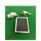 Assorted Metal Collectibles: Car Lighter, Pill Case Lighter, and Cigarette Case