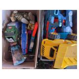 Assorted Toy Lot Including Foam Dart Blasters, Construction Vehicles, and Action Figures