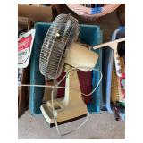 Electric Table Fan and Assorted Recipe Books in Plastic Bin