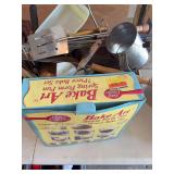 Kitchenware Assortment Including Betty Crocker Bake Set, Bromwell Measuring Sifter, Pyrex Loaf Pan, and Budweiser Glassware