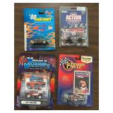 Collection of Four 1:64 Scale Die-Cast Model Cars