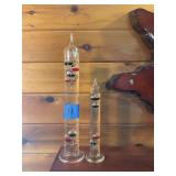 Two Glass Galileo Thermometers of Different Sizes