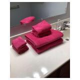 Assorted Bathroom Linens Lot Including Towels, Shower Curtains, and Bath Mats