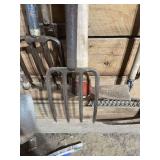 Assorted Farm Hand Tools Including Pitchforks and Shovels