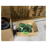 Assorted Green Ratchet Tie-Down Straps in Cardboard Box