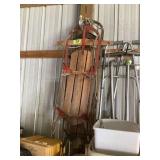Wooden Snow Sled with Red Metal Runners and Steering Bar