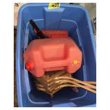 Blue Plastic Storage Bin with Red Gasoline Container and Wood Frame Items