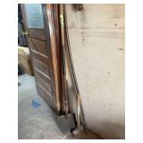 Assorted Long-Handled Hand Tools Including Shovel, Sledgehammer, and Pry Bar