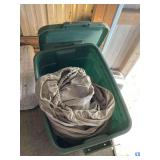 Green Plastic Storage Bin with Tan Fitted Textile Cover Inside