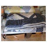 Blue and White Pieced Quilt with Floral and Geometric Patterns