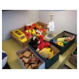 Table Lamp with Tiered Base and Assorted Boxed Toys Including Plush and Wooden Blocks