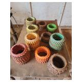 Assorted Stacks of Interlocking Metal and Composite Roller Mill Corrugations / Roll Segments