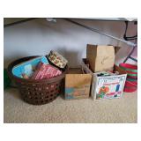 Assorted Holiday Decor Lot Including Tins, Light Bulbs, and Baskets