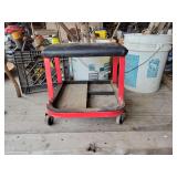 Red and Black Rolling Mechanic Seat with Integrated Tool Storage Tray