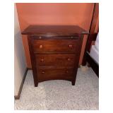 Dark Wood Three-Drawer Nightstand with Pull-Out Shelf