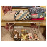 Assorted Quilts, Blankets, and Stuffed Animals