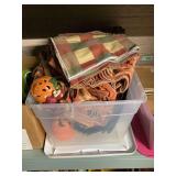 Lot of Halloween Decor, Pumpkin Figurines, and Fall Textiles in Plastic Storage Tote