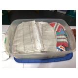 Assorted Fabrics and Household Items Lot including Plastic Storage Tote, Bath Mat, and Organizer