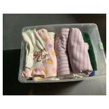 Assorted Towels and Linens in Plastic Storage Bin