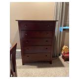 Dark Wood Five-Drawer Dresser with Round Wooden Pulls