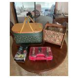 Household Lot Featuring Woven Picnic Basket, Wooden Magazine Rack, Battery Organizer, and HD TV Antenna