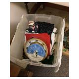 Plastic Storage Bin Filled with Holiday Textiles and Tableware