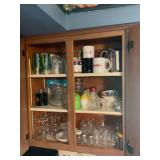 Assorted Kitchen Cabinet Contents Including Glassware, Ceramics, and Mugs