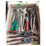 Assorted Hand Tools Including Pliers, Snips, and Multi-Tool