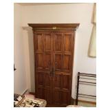 Large Wood Armoire Cabinet with Paneled Doors and Interior Shelving and Drawers
