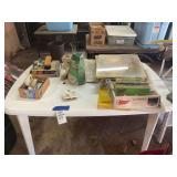 Table Lot 351 with Assorted Model Kits, Framed Picture, and Household Goods