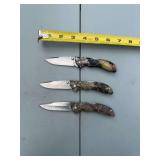 Set of Three Buck USA Folding Pocket Knives with Camouflage Handles