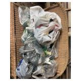 Assorted Plastic Grocery Bags Filled with Holiday String Lights