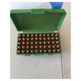 Ammunition in Green Plastic Storage Case