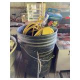 Bucket of Yellow Extension Cords and Power Sentry Power Strip