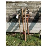 Assorted Garden Tools Including Pitchforks and Long-Handled Spades