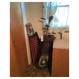 Two Sets of Golf Clubs with Bags