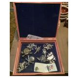 Collection of Assorted Pewter Pins and Badges in Wooden Display Box