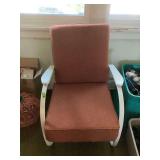 Metal Frame Glider Chair with Orange and Floral Cushions