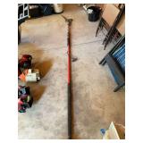 Red and Black Gas Powered Pole Pruner with Cutting Blade and Extension Shaft