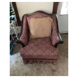Upholstered Armchair with Wood Trim and Accent Pillow