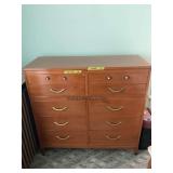 Wooden Bedroom Dresser with Multiple Drawers and Metal Hardware