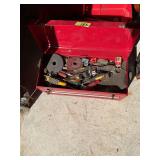 Red Metal Tool Box Filled with Assorted Hand Tools and Accessories