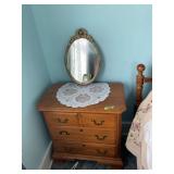 Wooden Dresser and Ornate Oval Wall Mirror