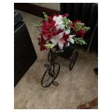 Decorative Tricycle Planter with Poinsettia Arrangement and Floral Display with American Flags