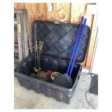 Large Storage Tote With Assorted Contents Including Paddles And Fireplace Tools